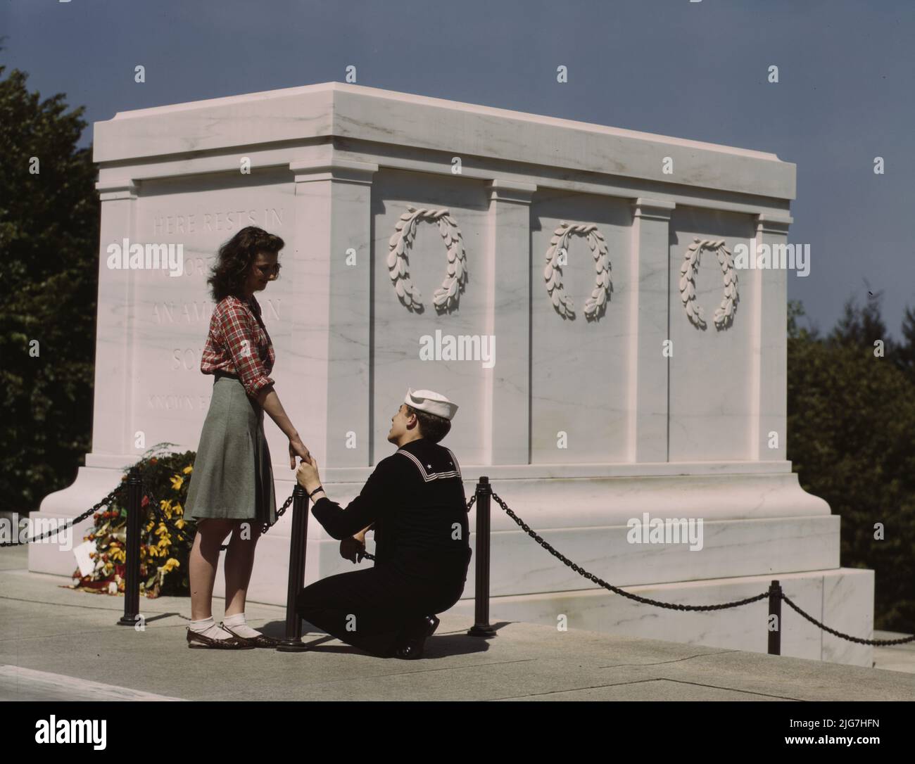 Sailor and girl at the Tomb of the Unknown Soldier, Washington, D.C. Photo shows sailor with Margaraet Mary CcCloskey [sic. Margaret Mary McCloskey?]. Stock Photo