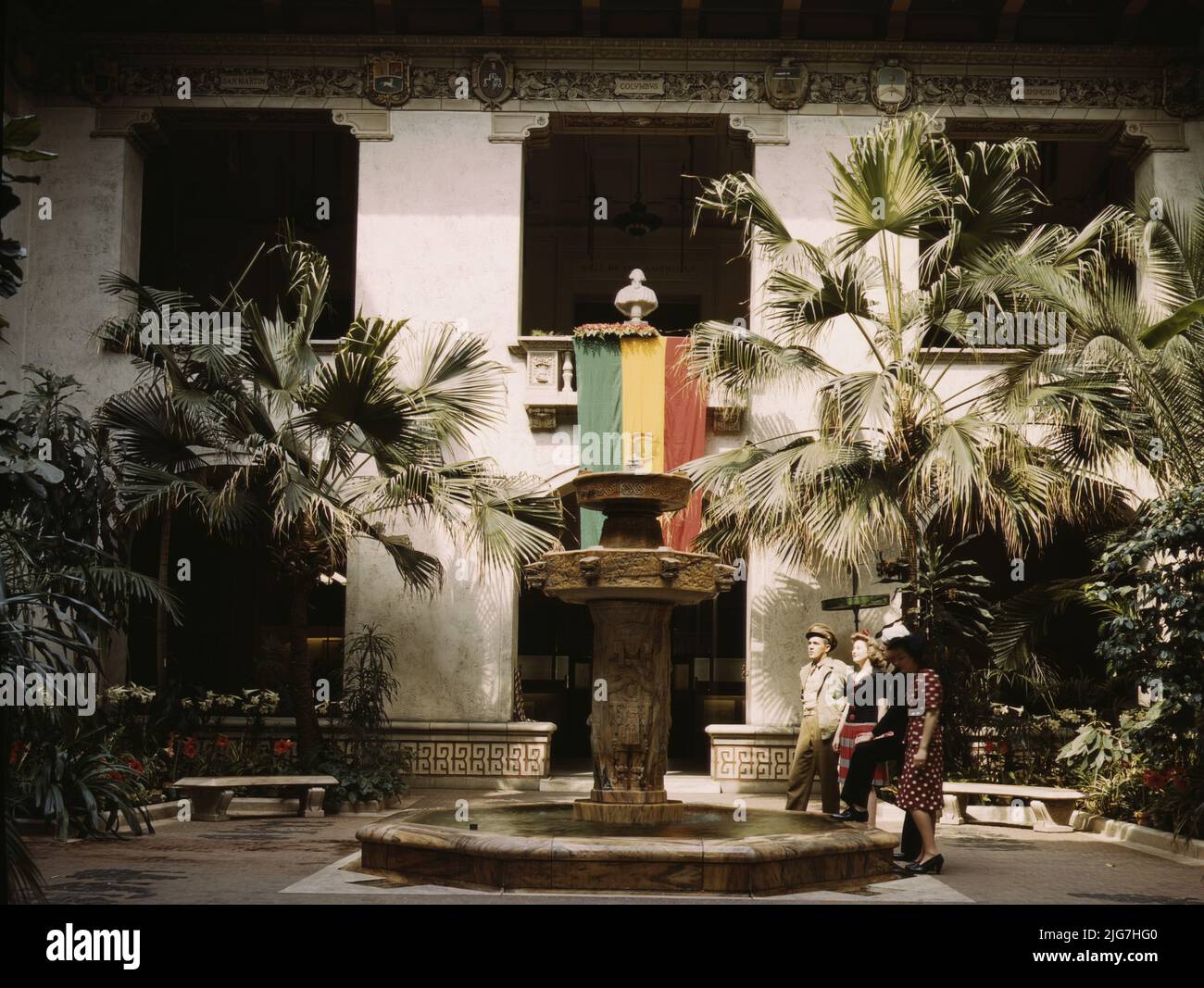 Courtyard of the Pan American Building, Washington, D.C. [Bolivian flag behind fountain. Headquarters of the Organization of American States, building designed by Paul P. Cret and Albert Kelsey]. Stock Photo