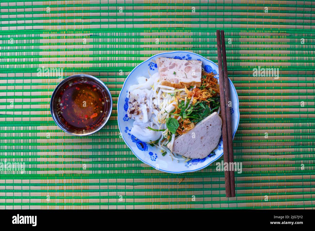 Banh cuon plate is made from rice flour served with lemon, chili ...