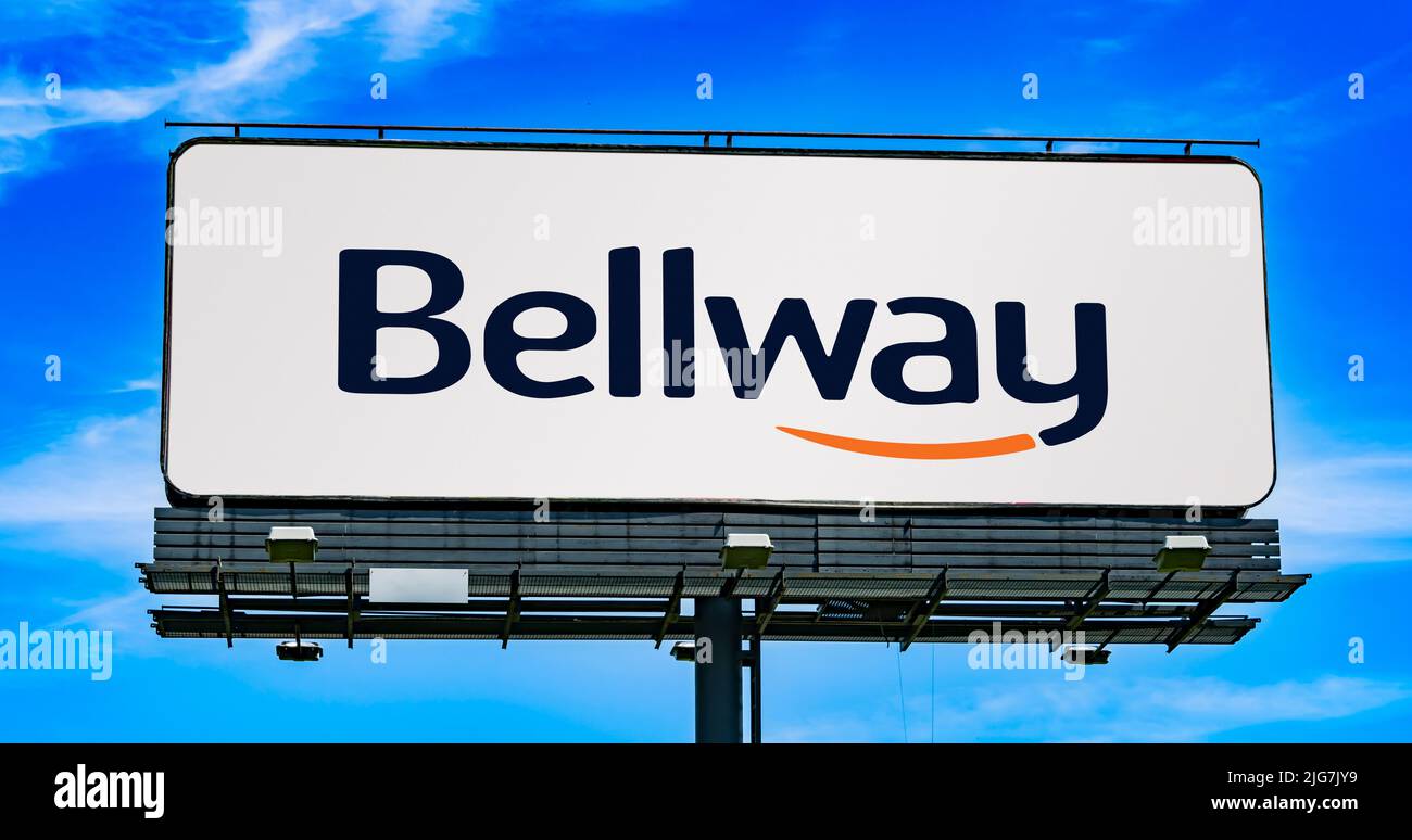 POZNAN, POL - JUN 23, 2022: Advertisement billboard displaying logo of Bellway, a residential property developer and housebuilder based in England Stock Photo