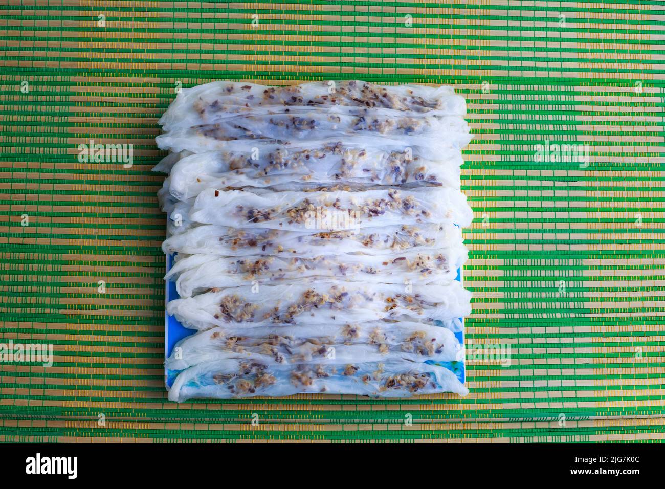 Banh cuon plate is made from rice flour served with lemon, chili ...