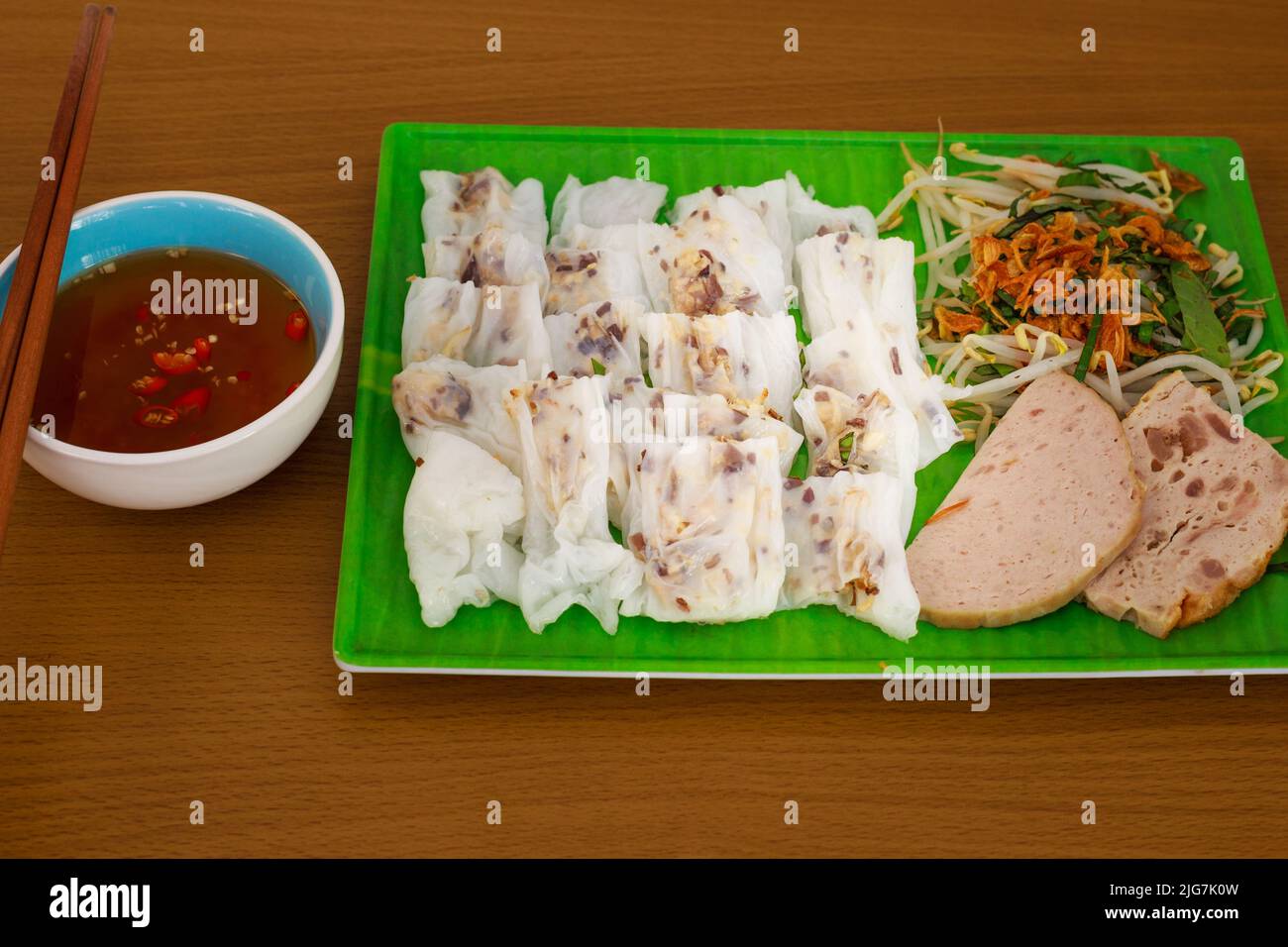 Banh cuon plate is made from rice flour served with lemon, chili ...