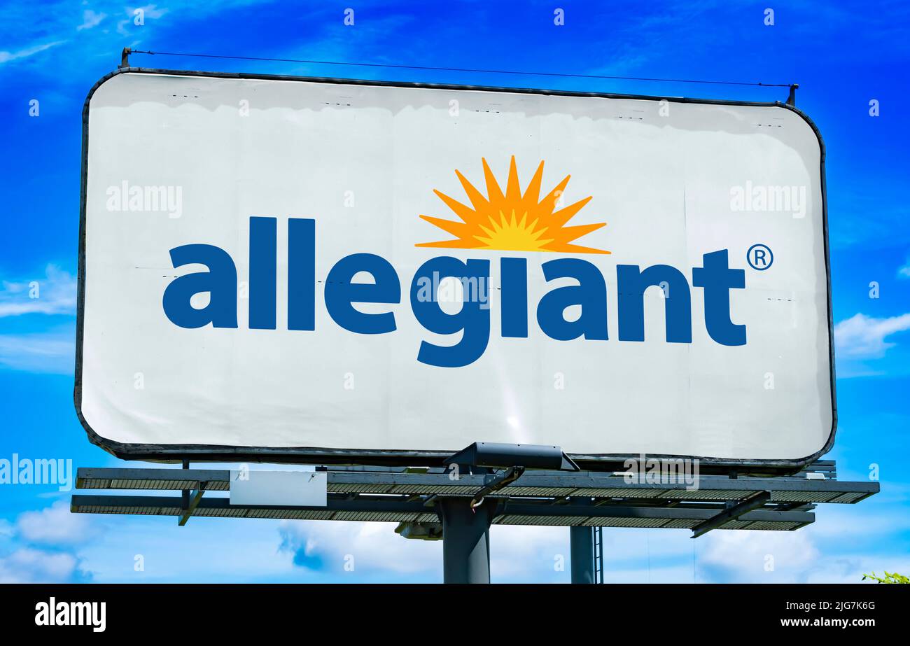 POZNAN, POL - JUN 23, 2022: Advertisement billboard displaying logo of Allegiant Air, an American ultra-low-cost airline that operates scheduled and c Stock Photo