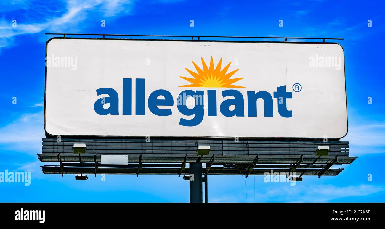 POZNAN, POL - JUN 23, 2022: Advertisement billboard displaying logo of Allegiant Air, an American ultra-low-cost airline that operates scheduled and c Stock Photo