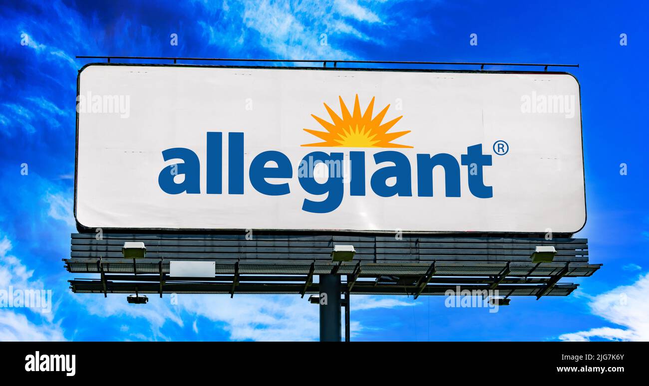 POZNAN, POL - JUN 23, 2022: Advertisement billboard displaying logo of Allegiant Air, an American ultra-low-cost airline that operates scheduled and c Stock Photo