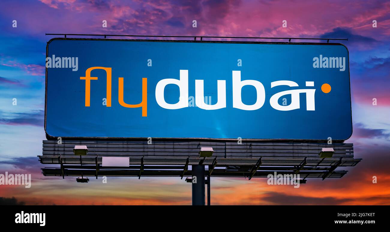 POZNAN, POL - JUN 23, 2022: Advertisement billboard displaying logo of Flydubai, an Emirati government-owned low-cost airline in Dubai, United Arab Em Stock Photo