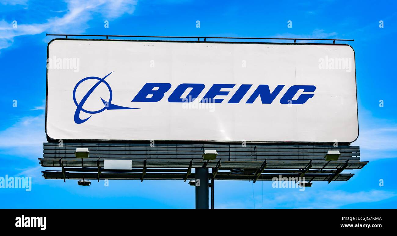 POZNAN, POL - JUN 28, 2022: Advertisement billboard displaying logo of The Boeing Company, an American multinational aerospace corporation Stock Photo