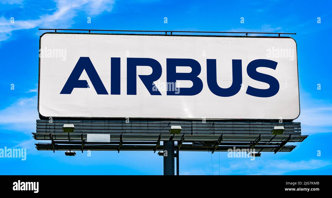 POZNAN, POL - JUN 28, 2022: Advertisement billboard displaying logo of Airbus, a European multinational aerospace corporation Stock Photo