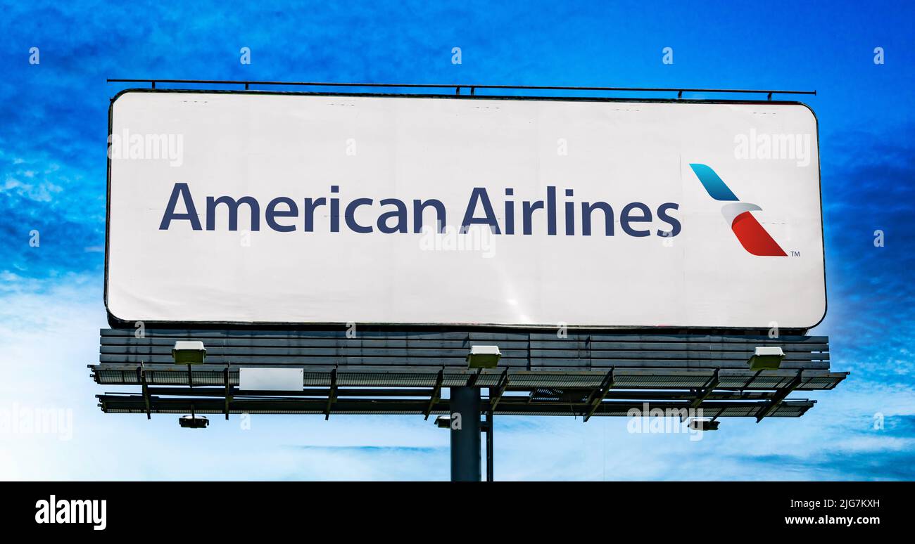 POZNAN, POL - JUN 28, 2022: Advertisement billboard displaying logo of American Airlines, a major US airline Stock Photo
