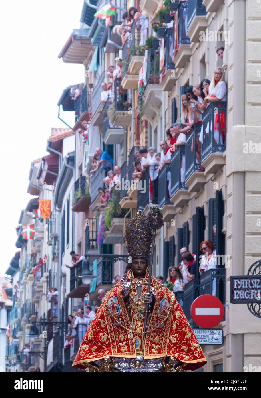 Image of San Fermin in the traditional procession of the saint and people on the balconies in the main street. July 07, 2022. Pamplona, Navarra, Spa Stock Photo