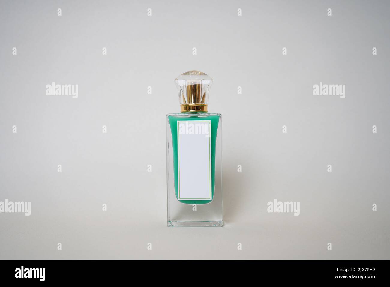 Close up of luxury perfume bottle with blurry bokeh light
