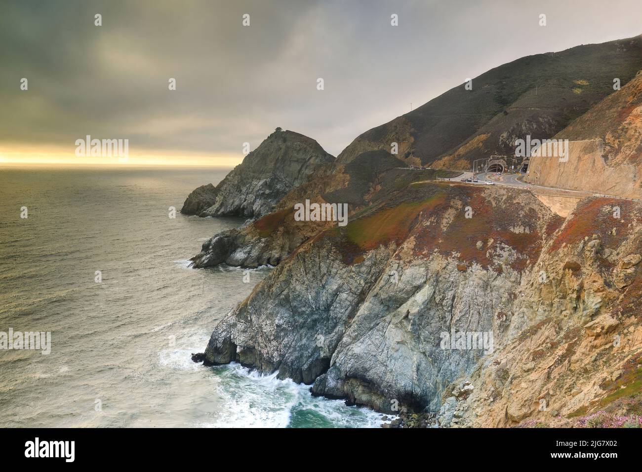Summer Foggy Sunset over Devil's Slide, Named After its Rocky Edges Prone to Accident. Pacifica and Montara, San Mateo County, California, USA. Stock Photo