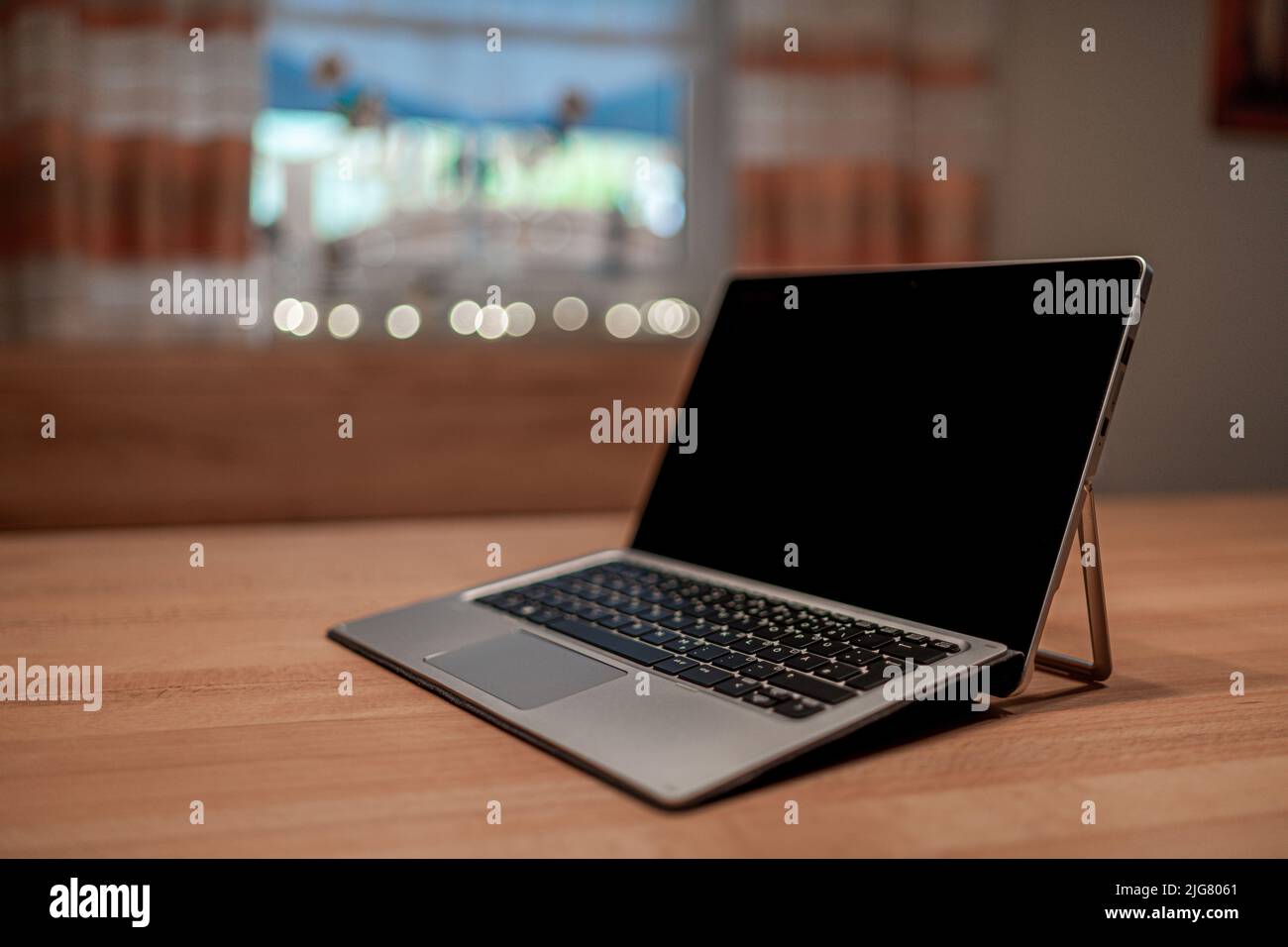 Tablet PC Convertible Laptop on a Wooden Table in Bavaria Germany Stock Photo