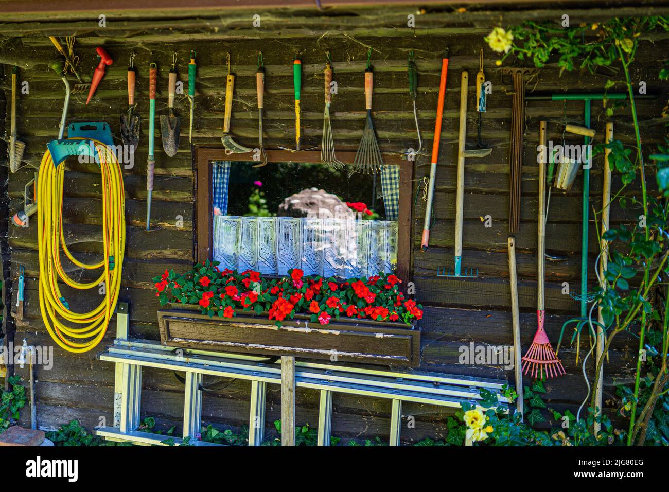 Garden Shed with Tools and Flower Pots in Lower Bavaria Germany Stock Photo