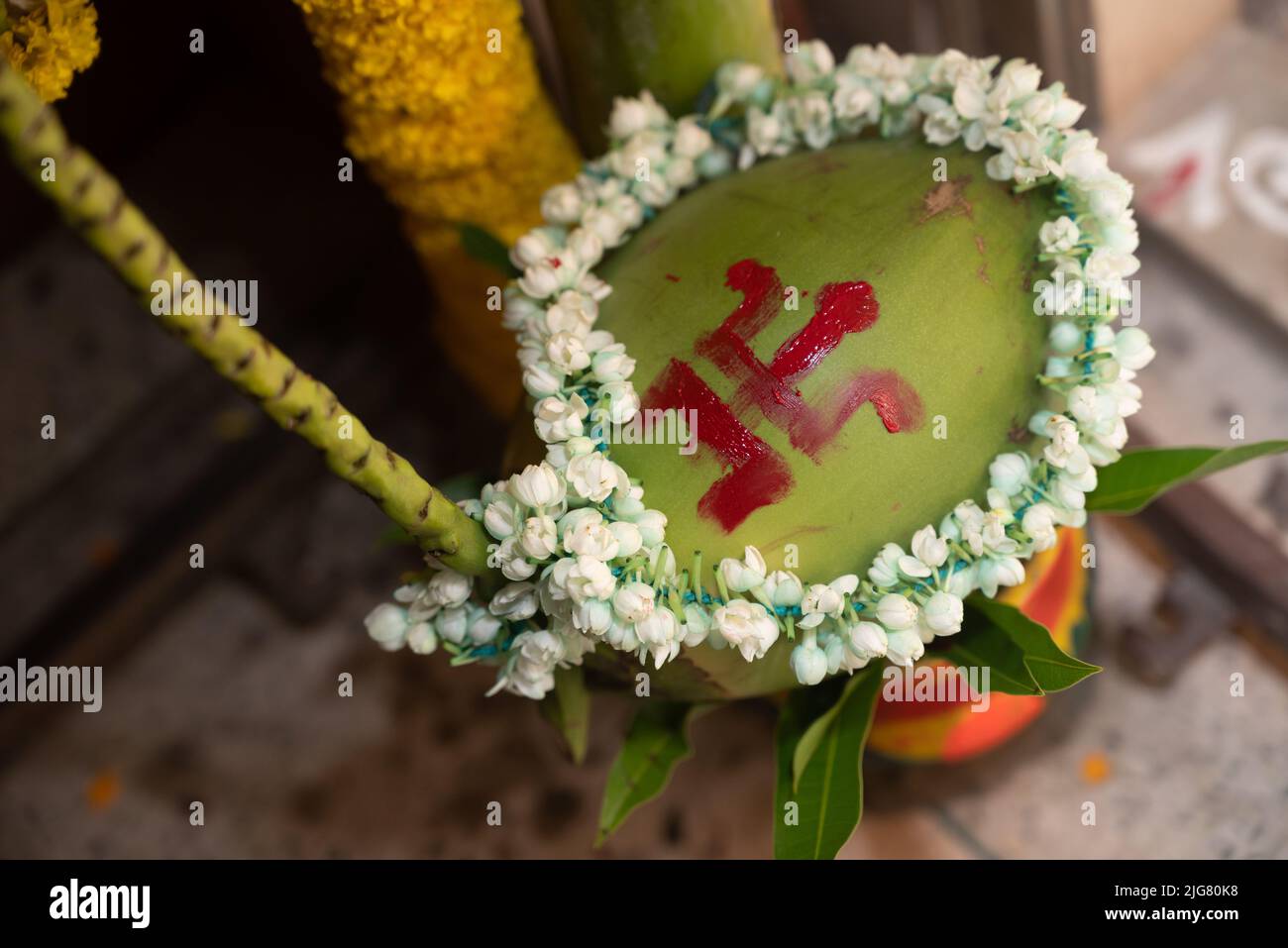 kalash pooja represents prosperity and powerin Hindu religion.A copper pot is filled with water. Kalash is the symbol of abundance and source of life. Stock Photo