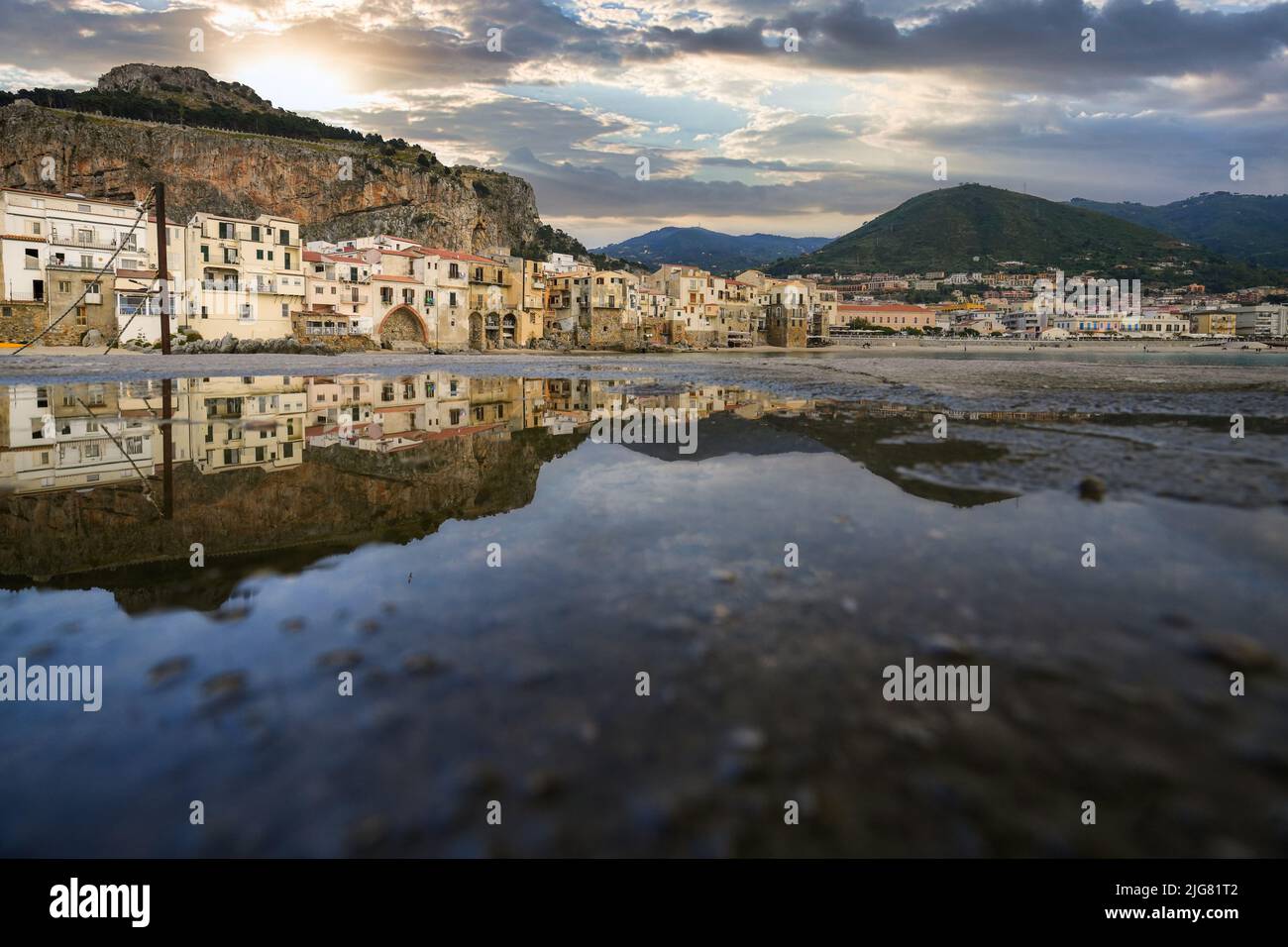 A Beautiful View Of The Coastline Of Cefalu A Picturesque Medieval a-beautiful-view-of-the-coastline-of-cefalu-a-picturesque-medieval