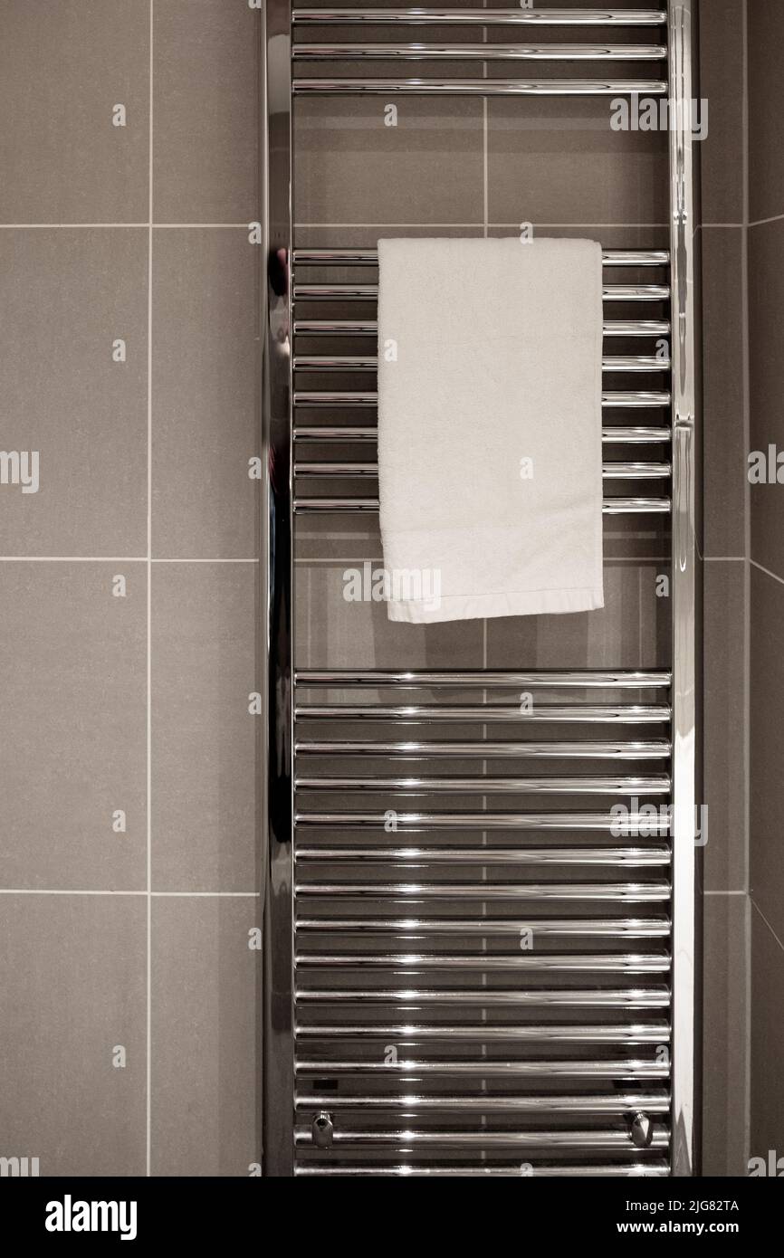 A ladder heated towel rail in a lodge at Centre Parcs Stock Photo Alamy