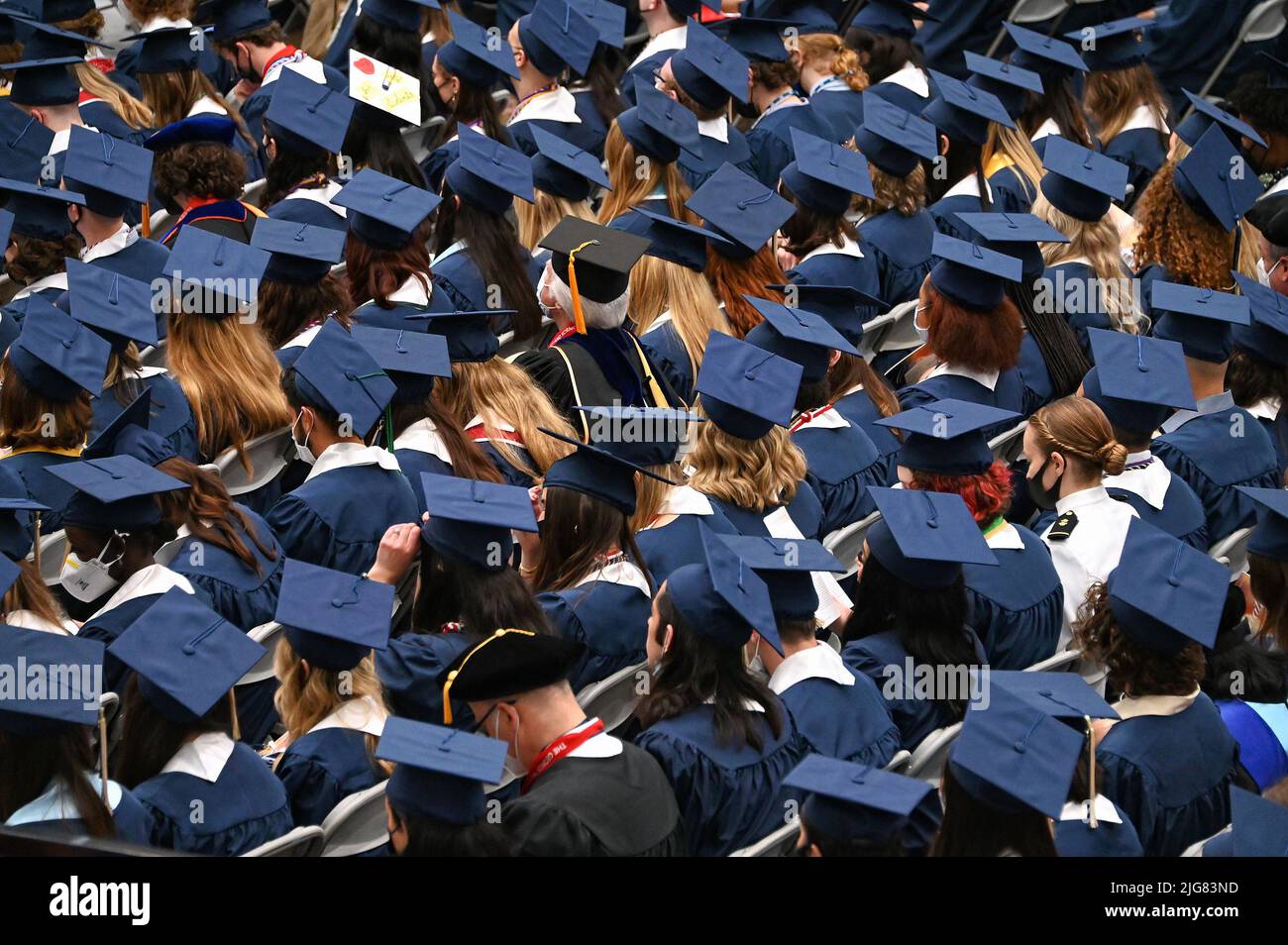 Washington University college students in traditional robe and