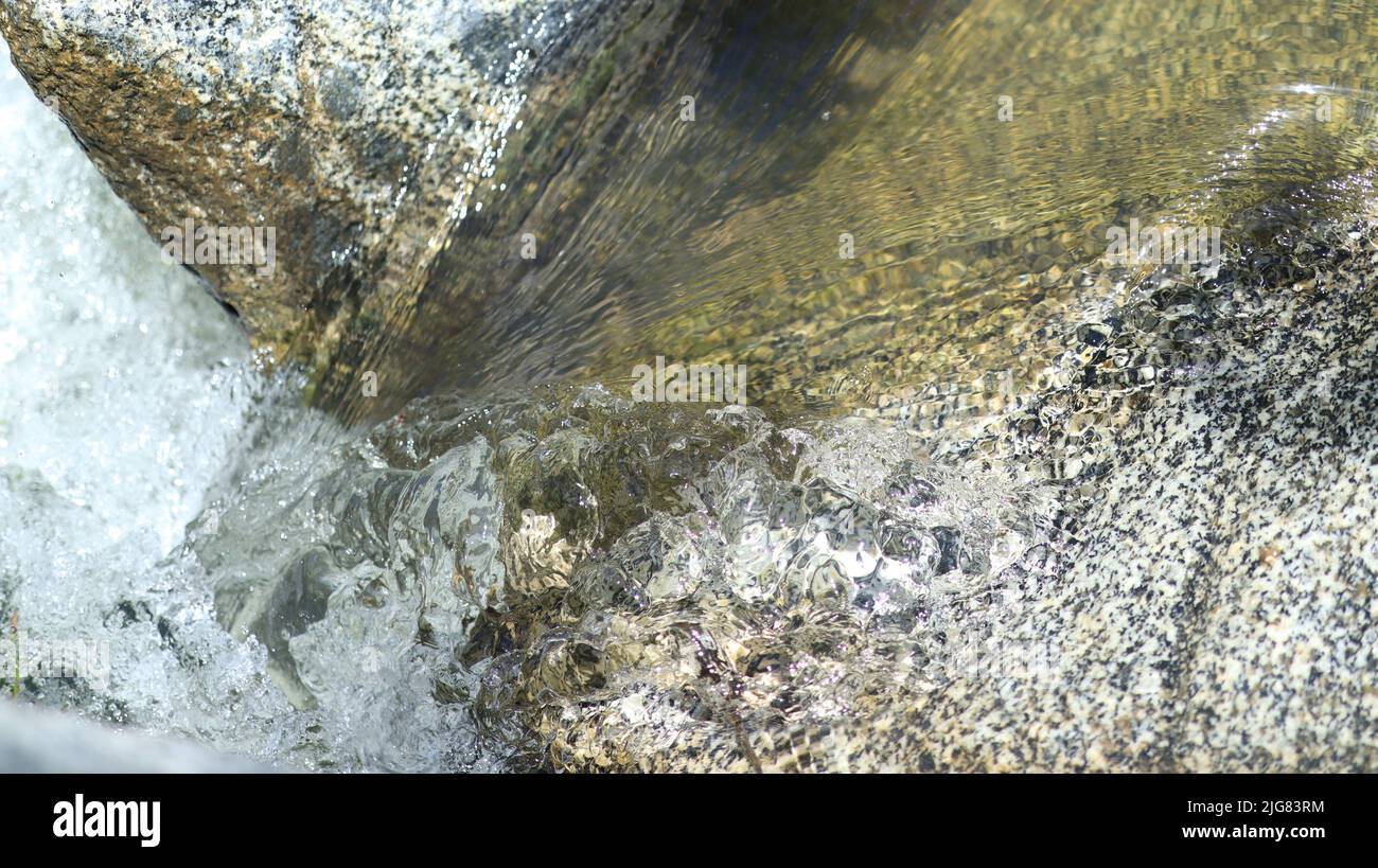 Pictures of water flowing through rocks on a hiking trail Stock Photo ...