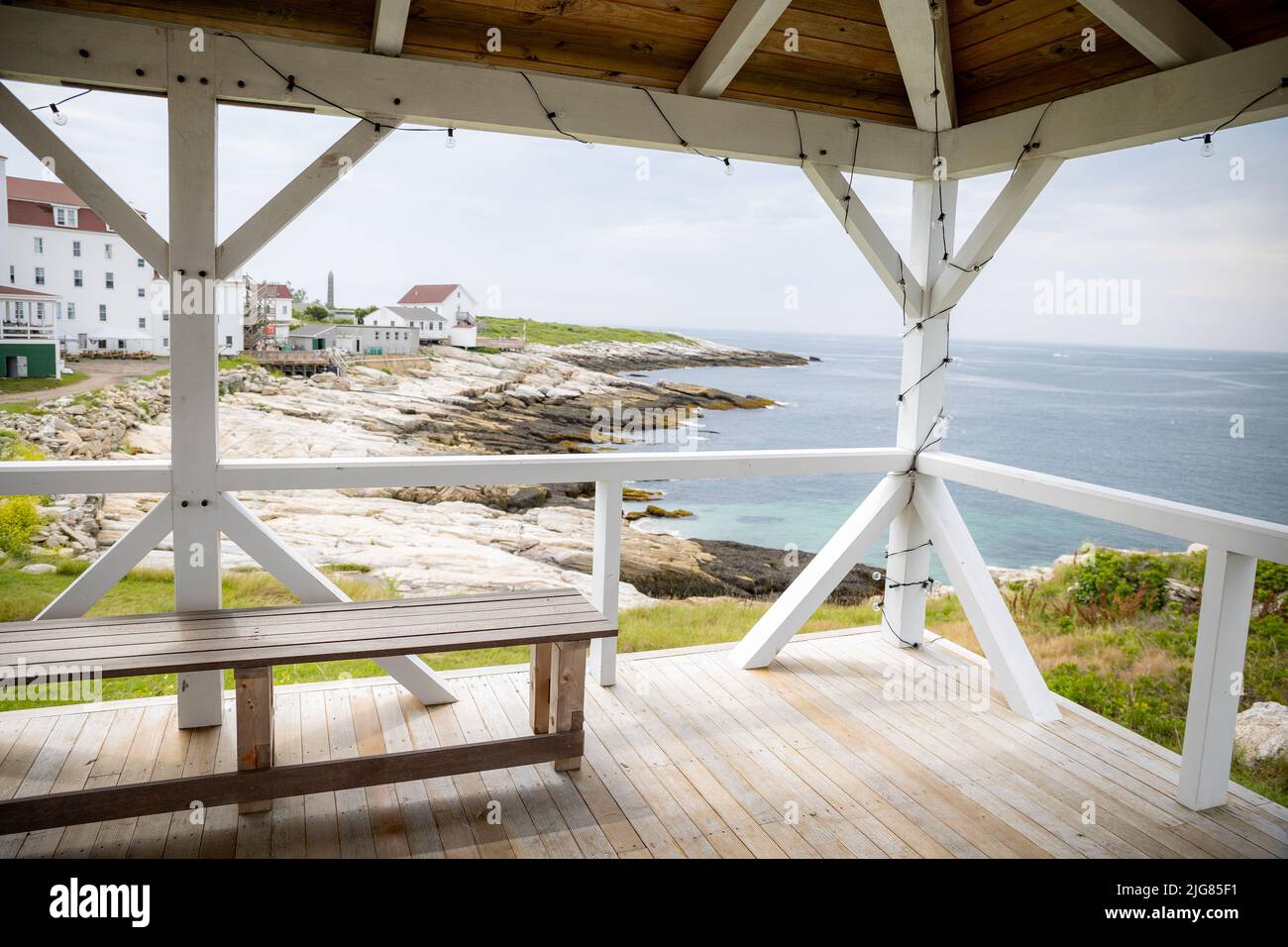 A wooden patio on a rocky seashore on Star Island Stock Photo