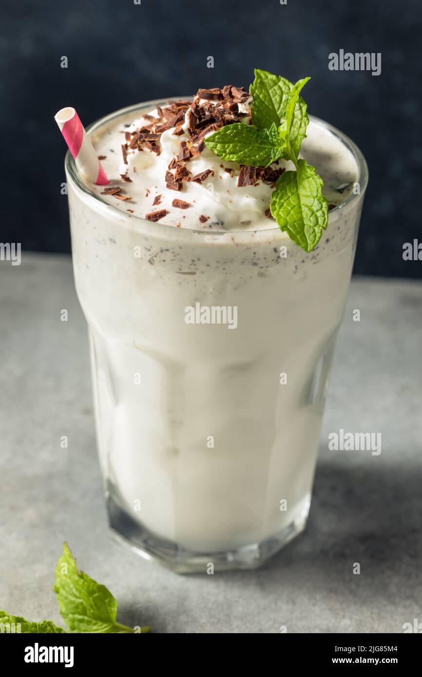 Homemade Green Chocolate Chip Mint Milkshake in a Glass Stock Photo Alamy