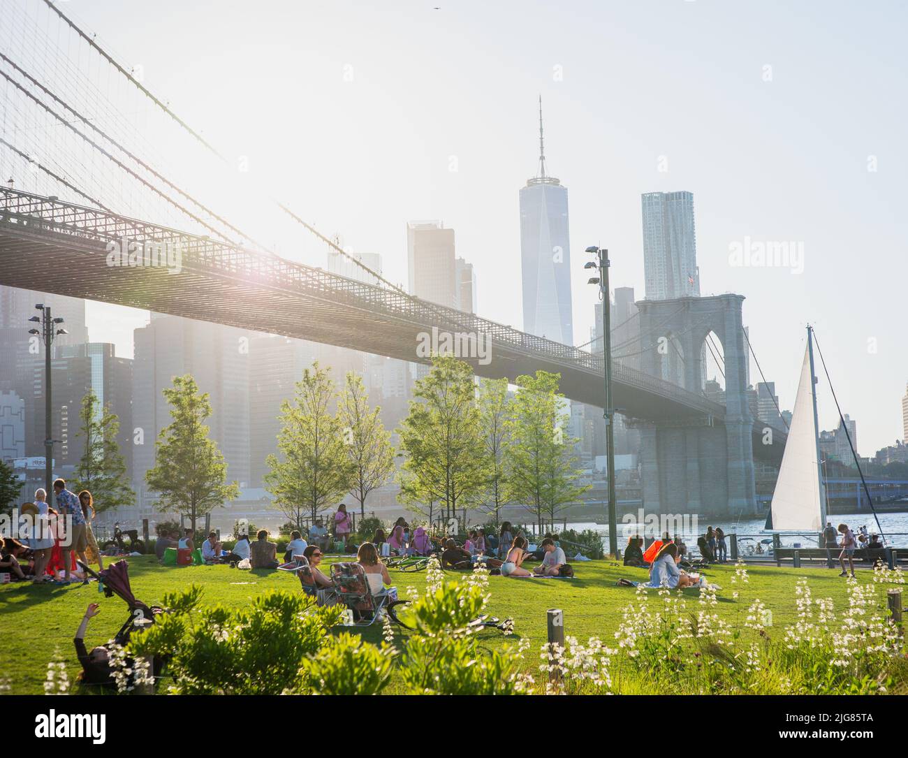 relaxing by the Brooklyn Bridge Stock Photo