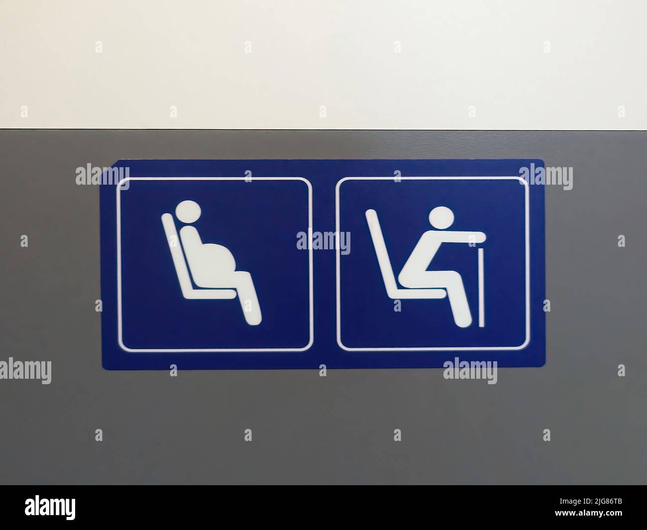 A priority seat sign for the disabled and pregnant women Stock Photo Alamy