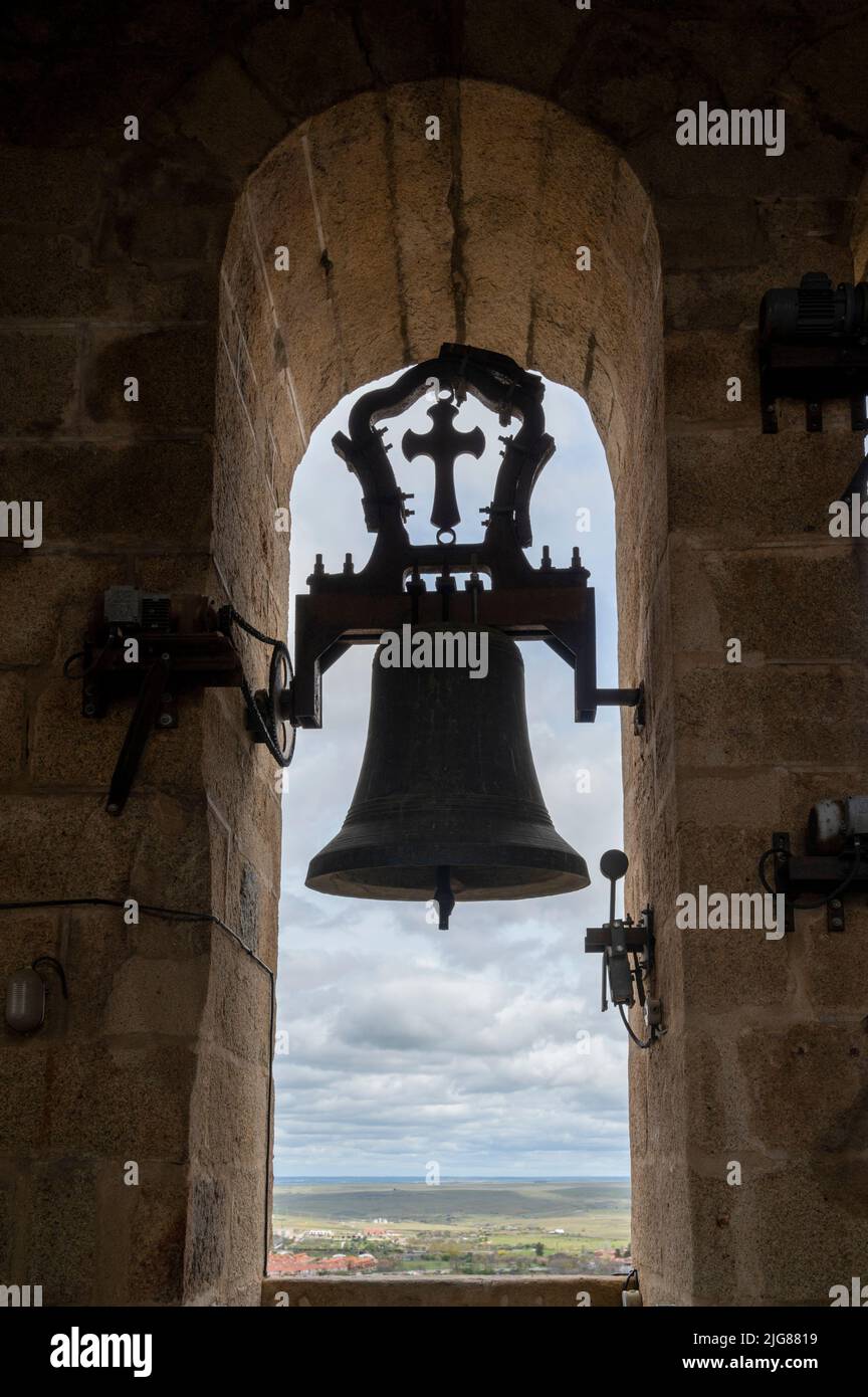 A bell in the bell tower at the Cathedral of Santa Maria in Caceres Spain, a world heritage site and medieval hill top town in Extremadura Spain Stock Photo