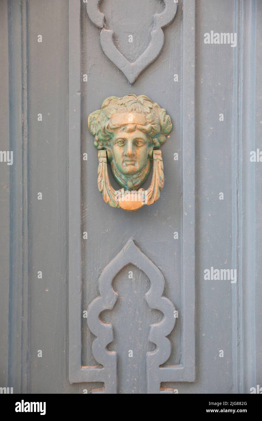 Detail of ornate front door with door knocker, Baska resort, Krk Island, Kvarner Bay, Primorje-Gorski kotar County, Croatia, Europe Stock Photo