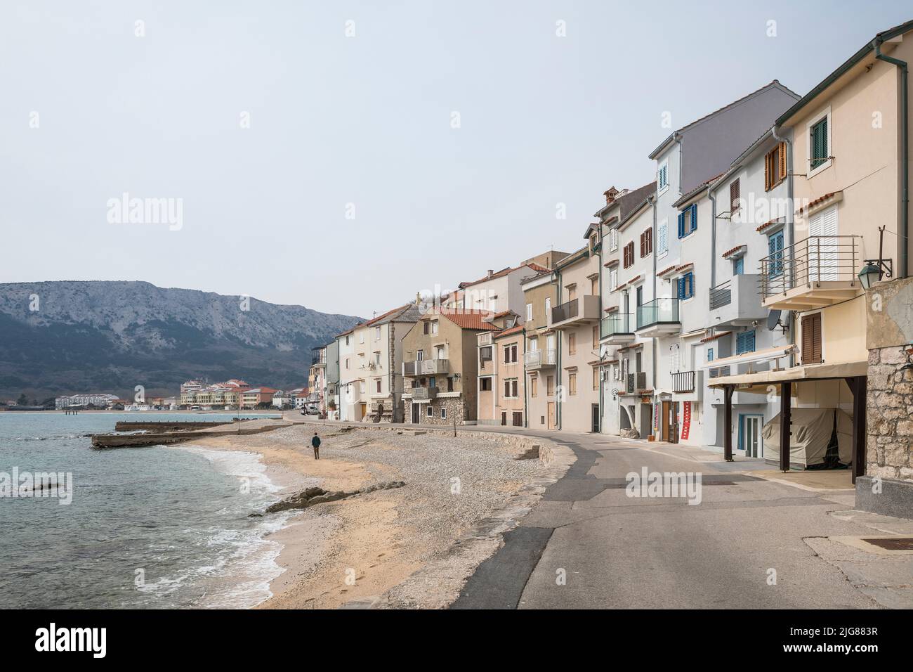 Beach and promenade in winter, Baska resort, Adriatic coast, Krk island, Kvarner bay, Primorje-Gorski kotar county, Croatia, Europe Stock Photo
