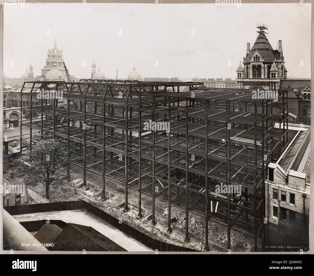 Geological Museum, Exhibition Road, Kensington, Kensington and Chelsea, Greater London Authority, 31-10-1930. An elevated view from the north-west showing the steel frames of the Geological Museum during construction. The Geological Museum moved from its site on Jermyn Street to this new building on Exhibition Road in 1935. The new museum was designed by Sir Richard Allison and John Hatton Markham of H M Office of Works. The steel frames used in the construction of the building were manufactured by Banister, Walton and Co Ltd. The Geological Museum subsequently became part of the Natural Histo Stock Photo