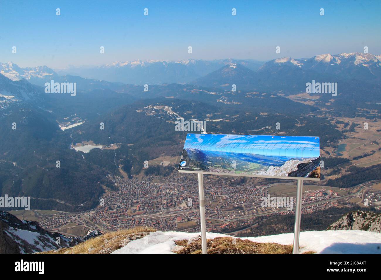 Panoramic map, view from Karwendel, at the top station Karwendelbahn to Estergebirge, in the foreground Mittenwald, against blue sky, Stock Photo