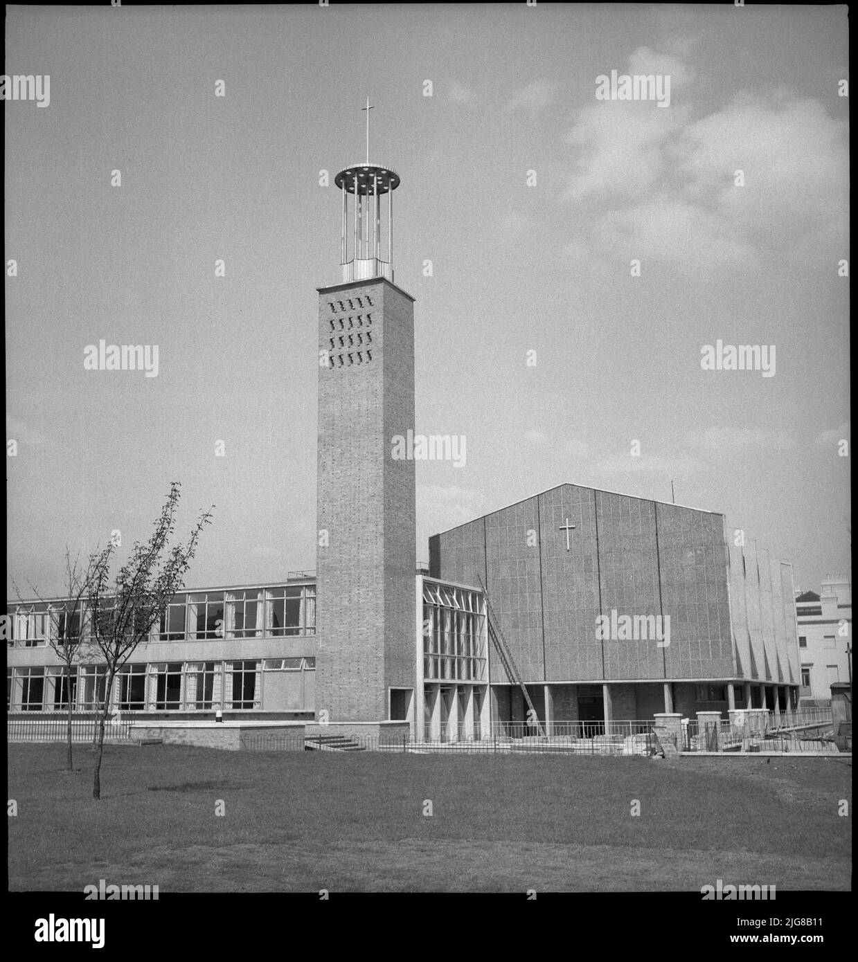 Trinity Congregational Church, East India Dock Road, Lansbury Estate, Tower Hamlets, Greater London Authority, 1951. View from the west of Trinity Congregational Church and Hall, now Trinity Methodist Church. Trinity Congregational Church (later Trinity Methodist Church), was built in 1950-51 by Cecil Handisyde and D Rogers Stark. The building was part of the 'Live' Architecture exhibition at the Festival of Britain in 1951. Stock Photo