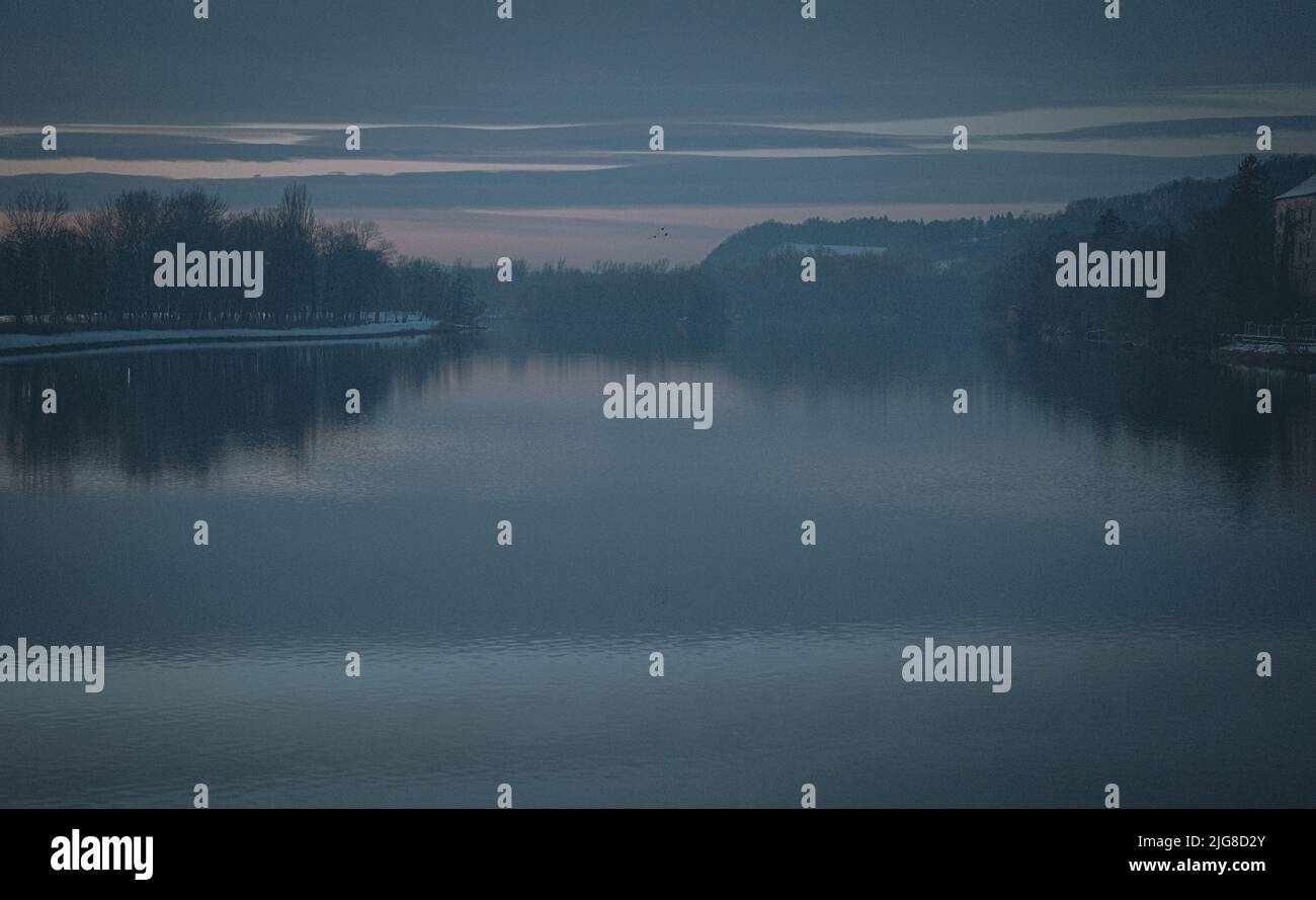An aerial view of lake surrounded by growing trees Stock Photo - Alamy