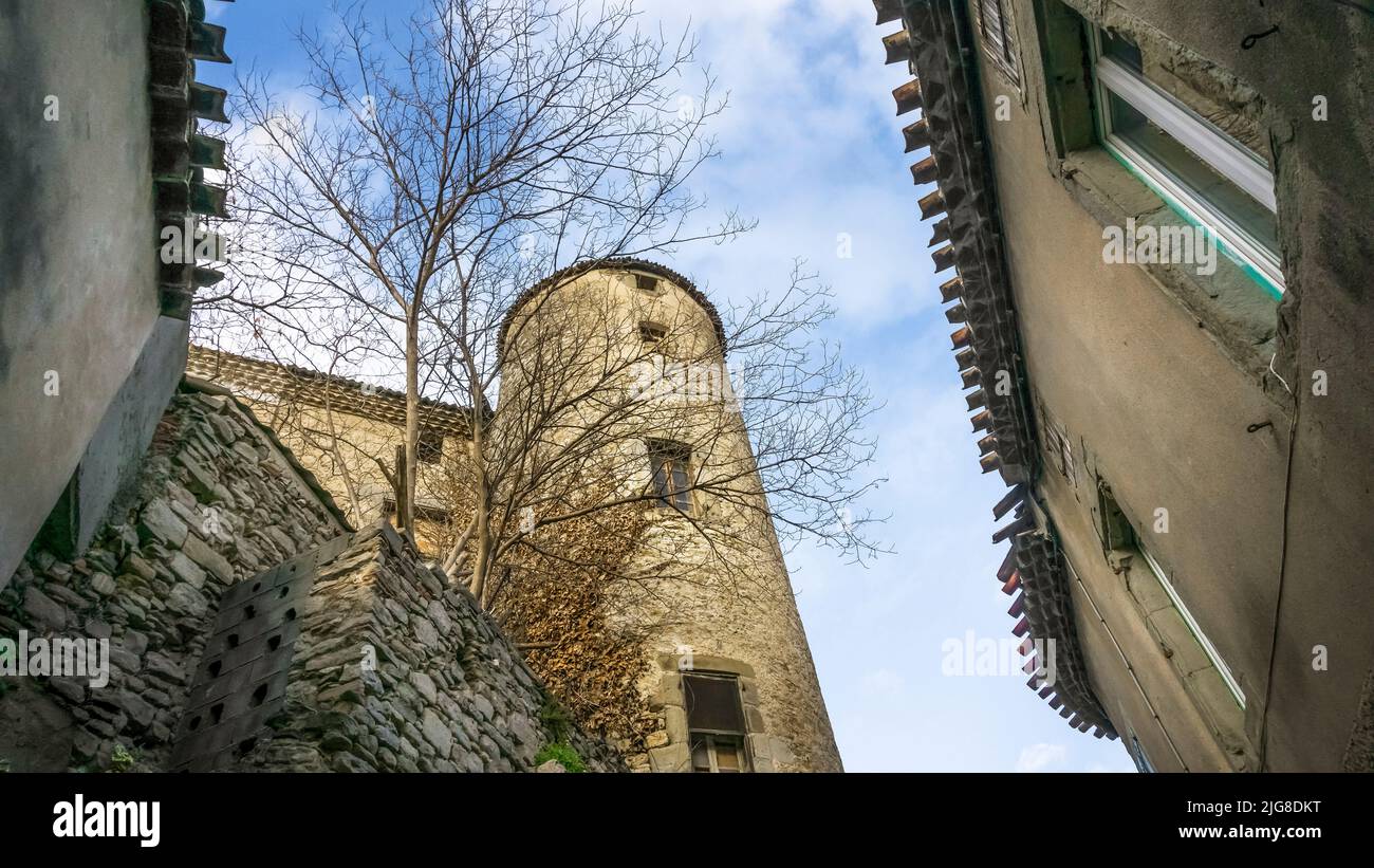 Round tower of the castle in Cesseras. Stock Photo