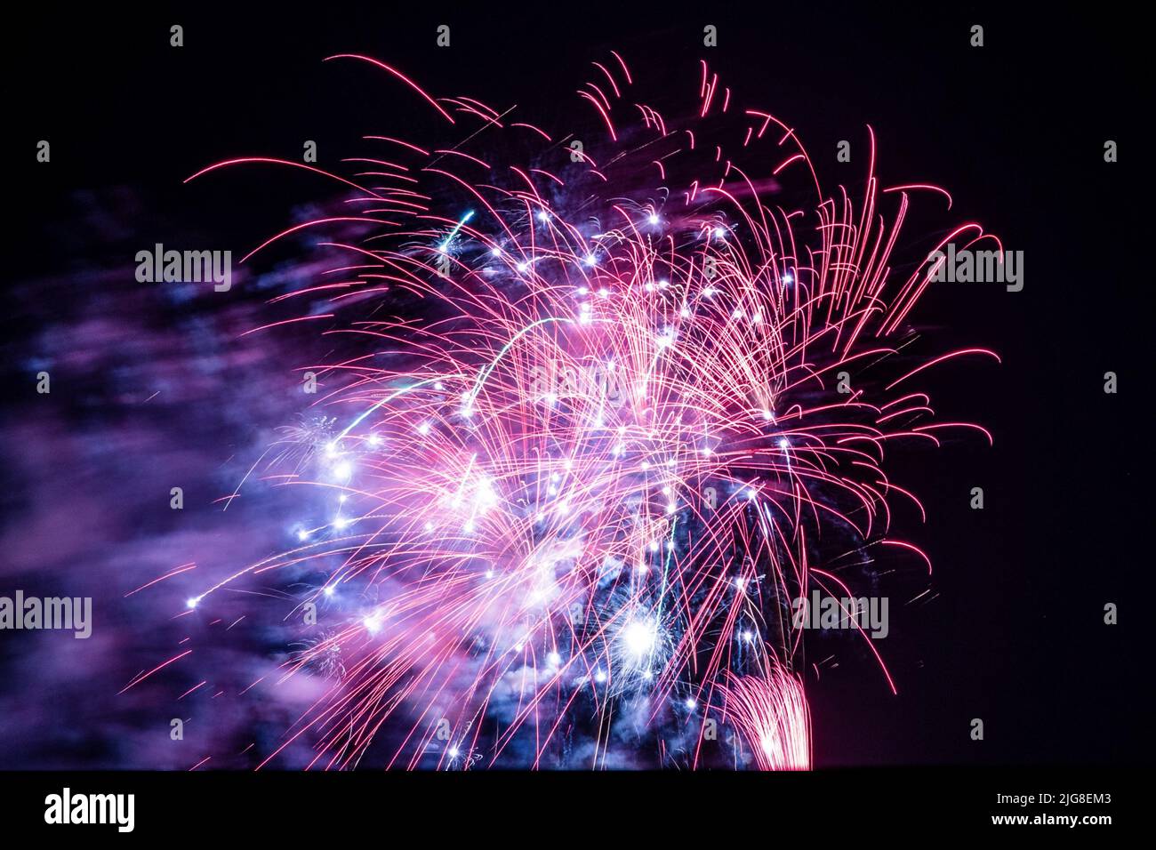 Fireworks in the foreground that color the night sky Stock Photo
