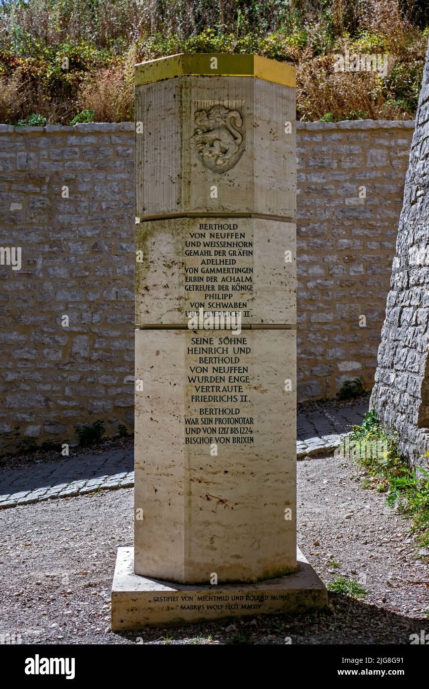 Staufer stele in front of the Hohenneuffen castle ruins Stock Photo