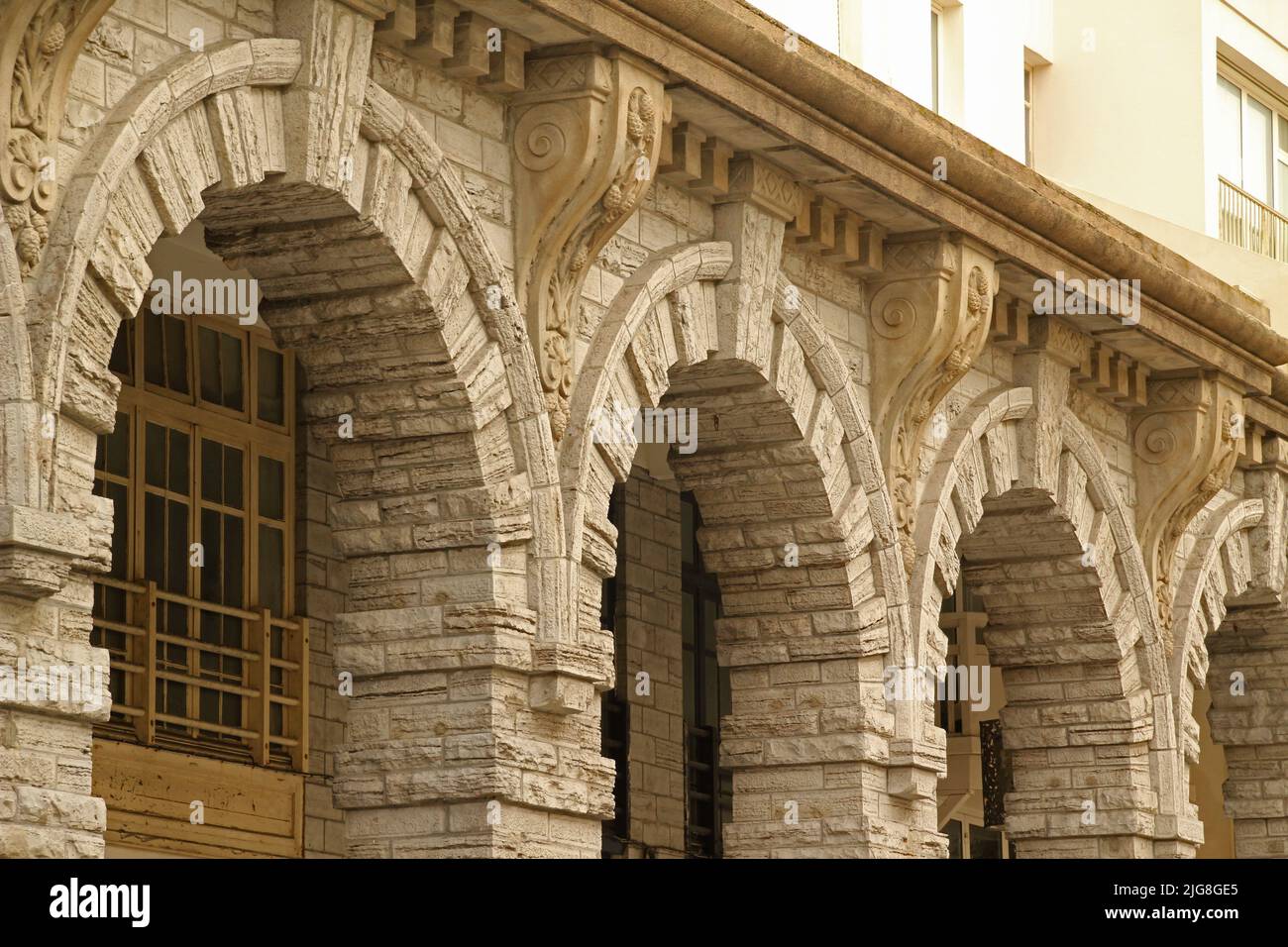 A beautiful shot of stone arches on the aged building Stock Photo