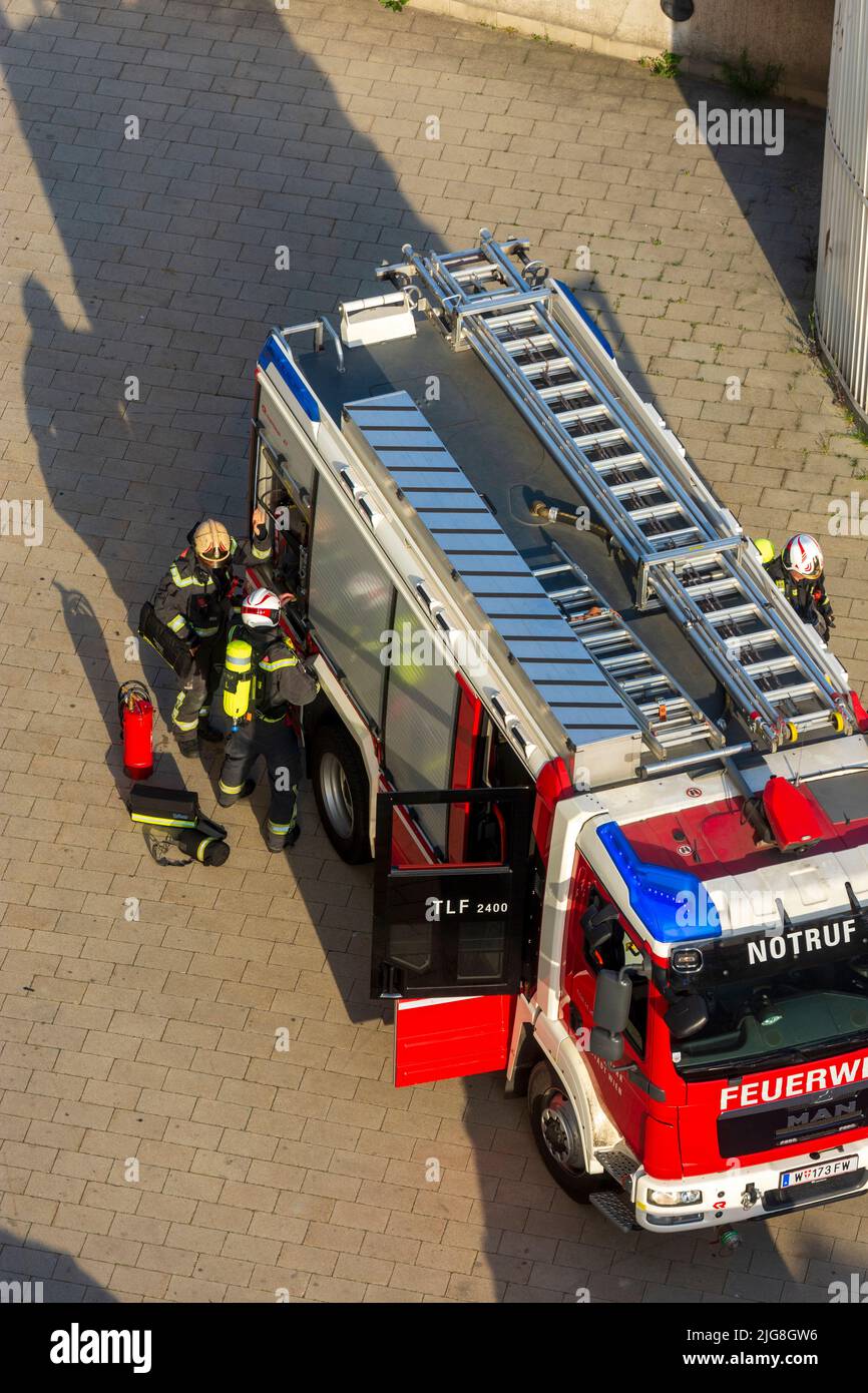 Vienna, fire department trucks, firemen on the way to a fire in 22. district Donaustadt, Wien, Austria Stock Photo