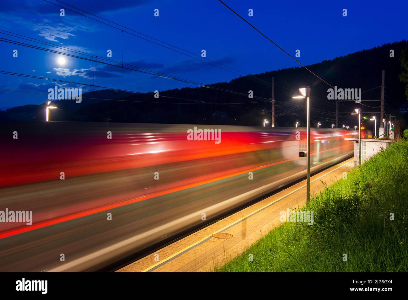 Payerbach, Semmeringbahn (Semmering Railway), station Küb, full moon, Railjet train of ÖBB in the Vienna Alps, Lower Austria, Austria Stock Photo