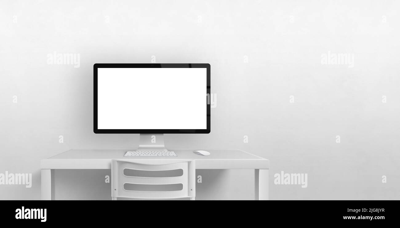 Computer screen mockup on work desk with copy space Stock Photo