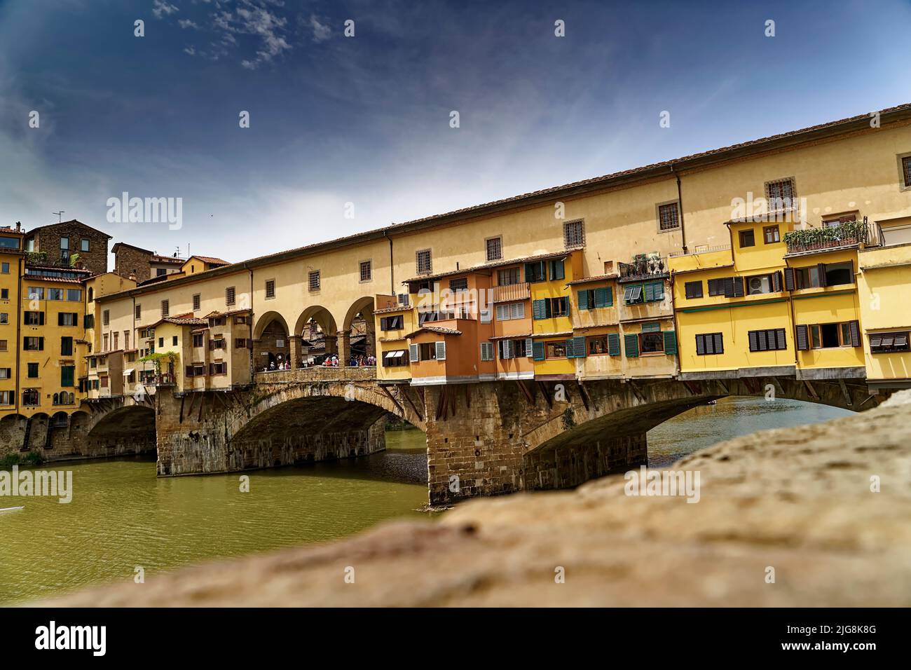 A beautiful view of Ponte Vecchio closed-spandrel arch bridge in Florence, Italy Stock Photo