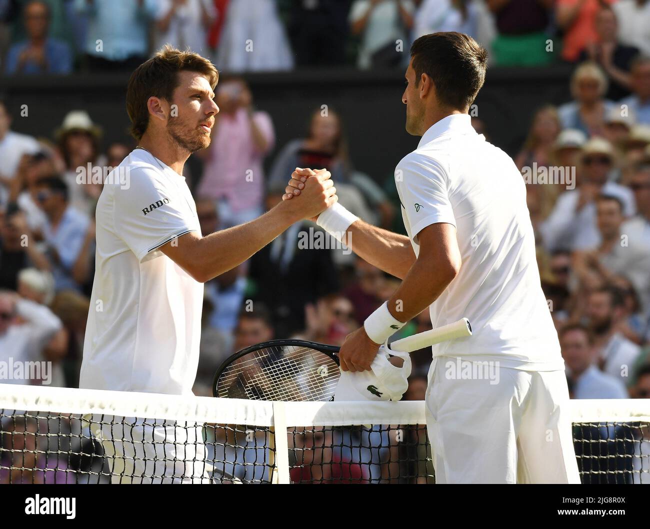 London, Gbr. 08th July, 2022. London Wimbledon Championships Day 08/07/2022 Novak Djokovic (SRB) wins semi-final match and shakes hands with Cameron Norrie (GBR) Credit: Roger Parker/Alamy Live News Stock Photo