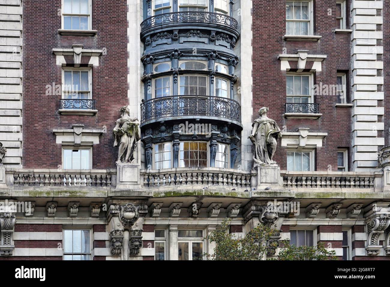 Facade of the Dorilton, a baroque style Manhattan apartment building with ornate decorative stone carving and bow window Stock Photo