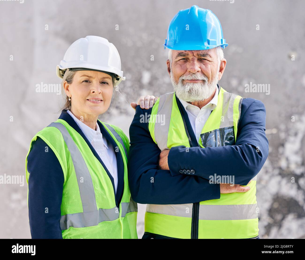 Ability is what youre capable of doing. Shot of engineers standing with ...