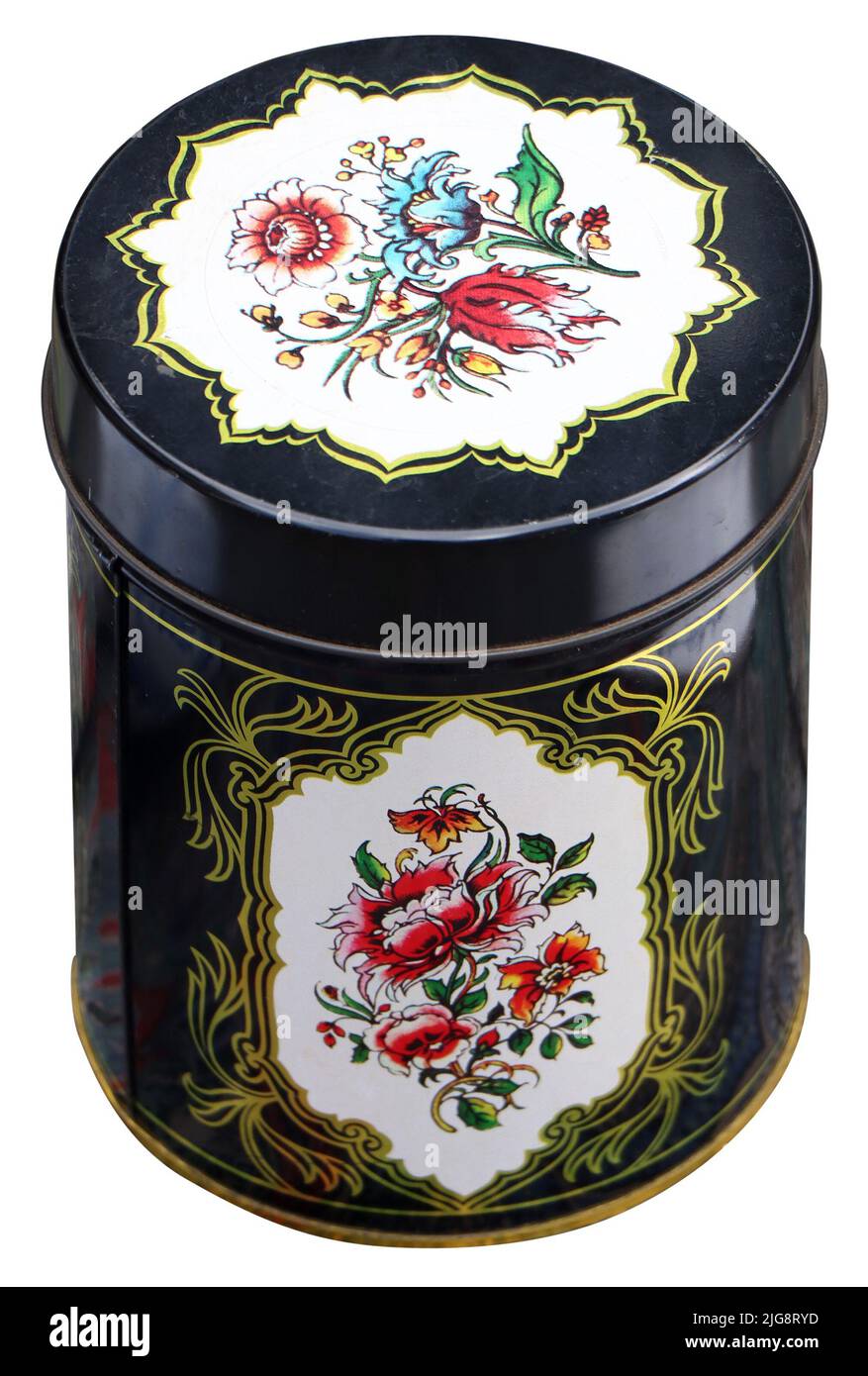 Old black Vintage round tin box, decorated with flowers Stock Photo