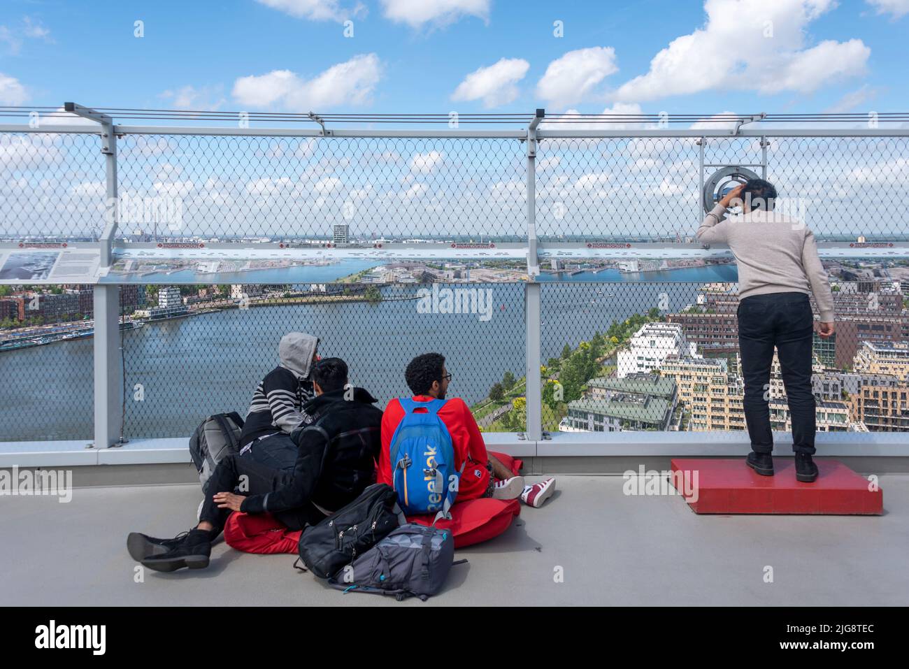 Tourists look out over Amsterdam, Netherlands from A'DAM Tower Stock Photo