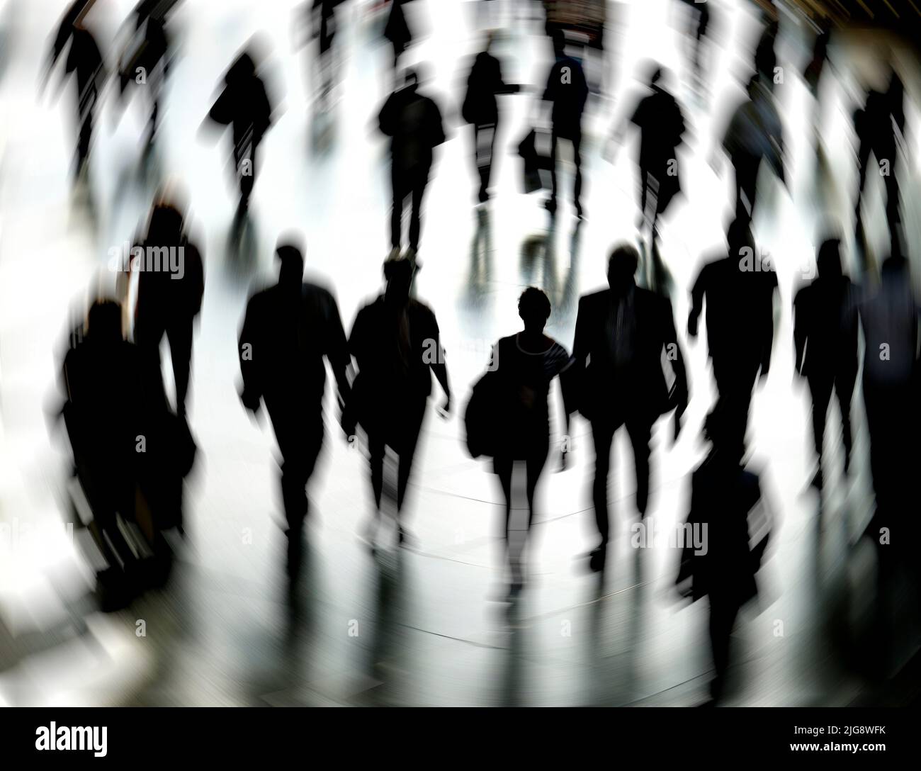 Germany, Bavaria, Munich, pedestrian, backlight, silhouette, blurred, rotated Stock Photo