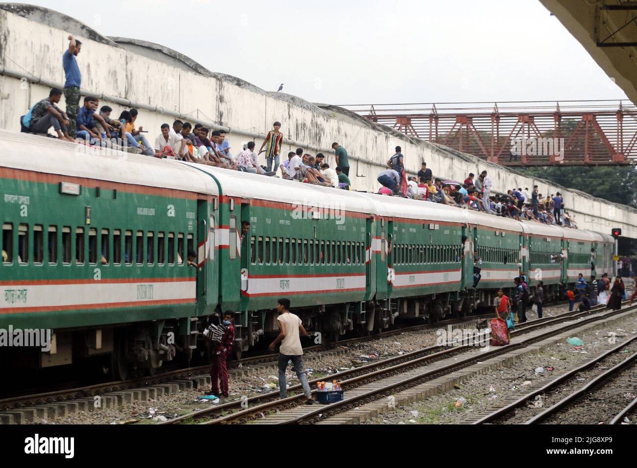 Dhaka, Bangladesh. 8th July 2022. Home-bound people waits for train as ...