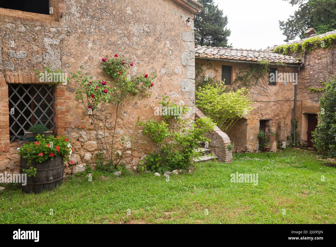 The 12th century Borgo Tolomei is a noble vacation residence near Sovicille, Siena region. Stock Photo